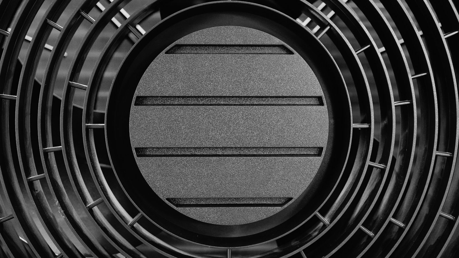 Close-up of a heat pump fan grille