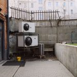 Heat pump outdoor units in a courtyard