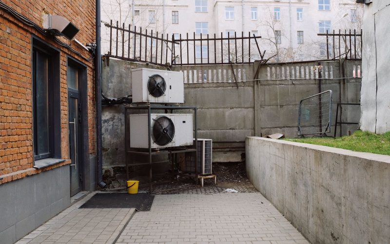 Heat pump outdoor units in a courtyard