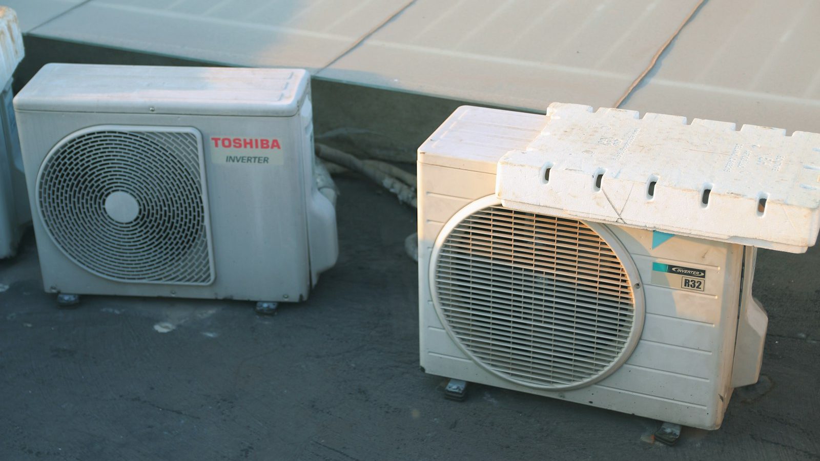 Two mini-split condensers side by side