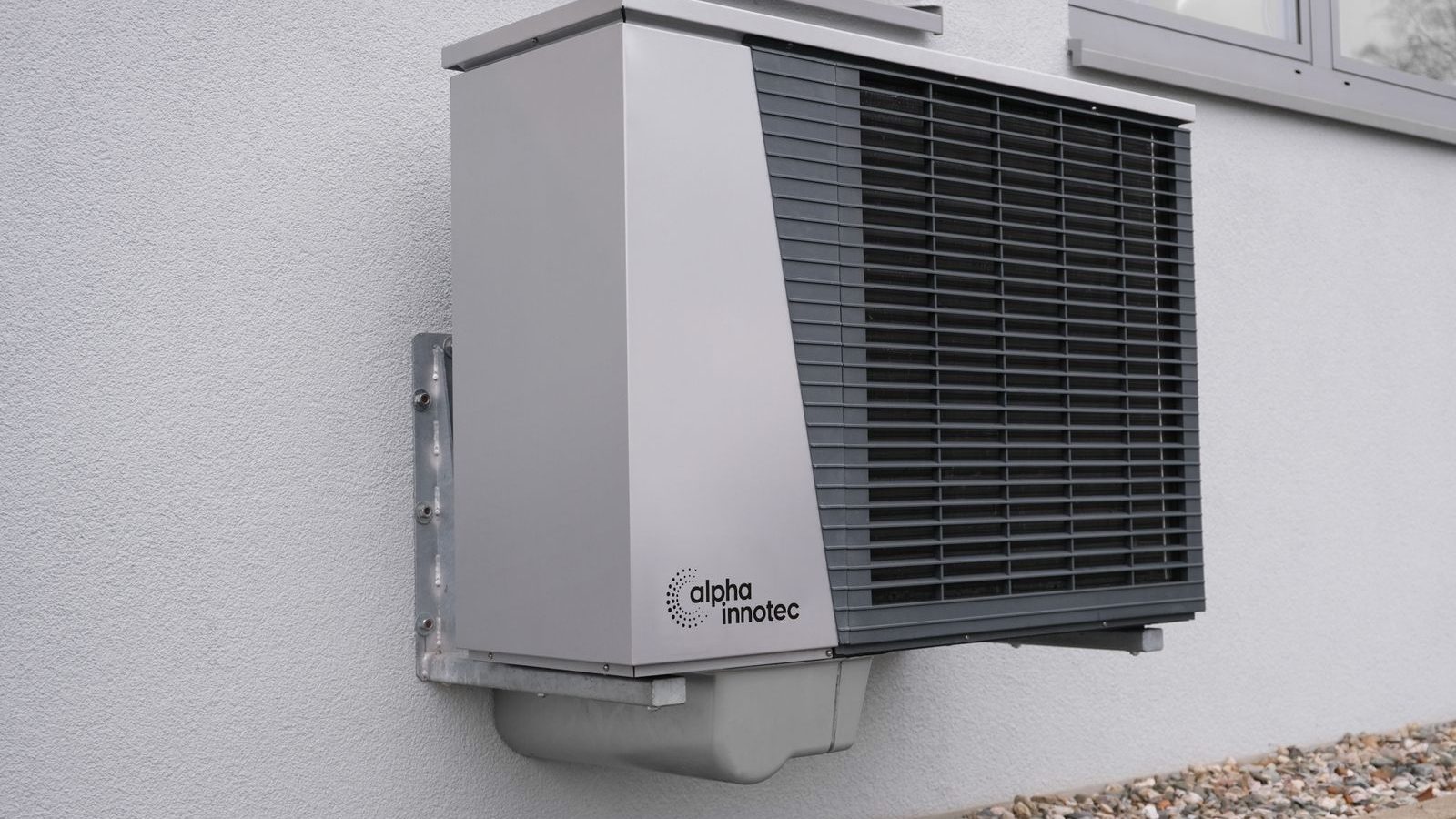 Wall-mounted air-source heat pump unit
