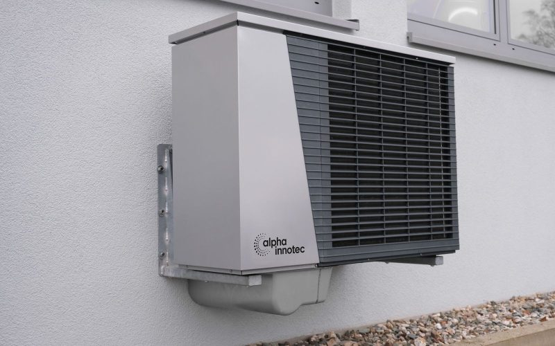 Wall-mounted air-source heat pump unit