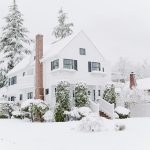 White house covered in snow during winter