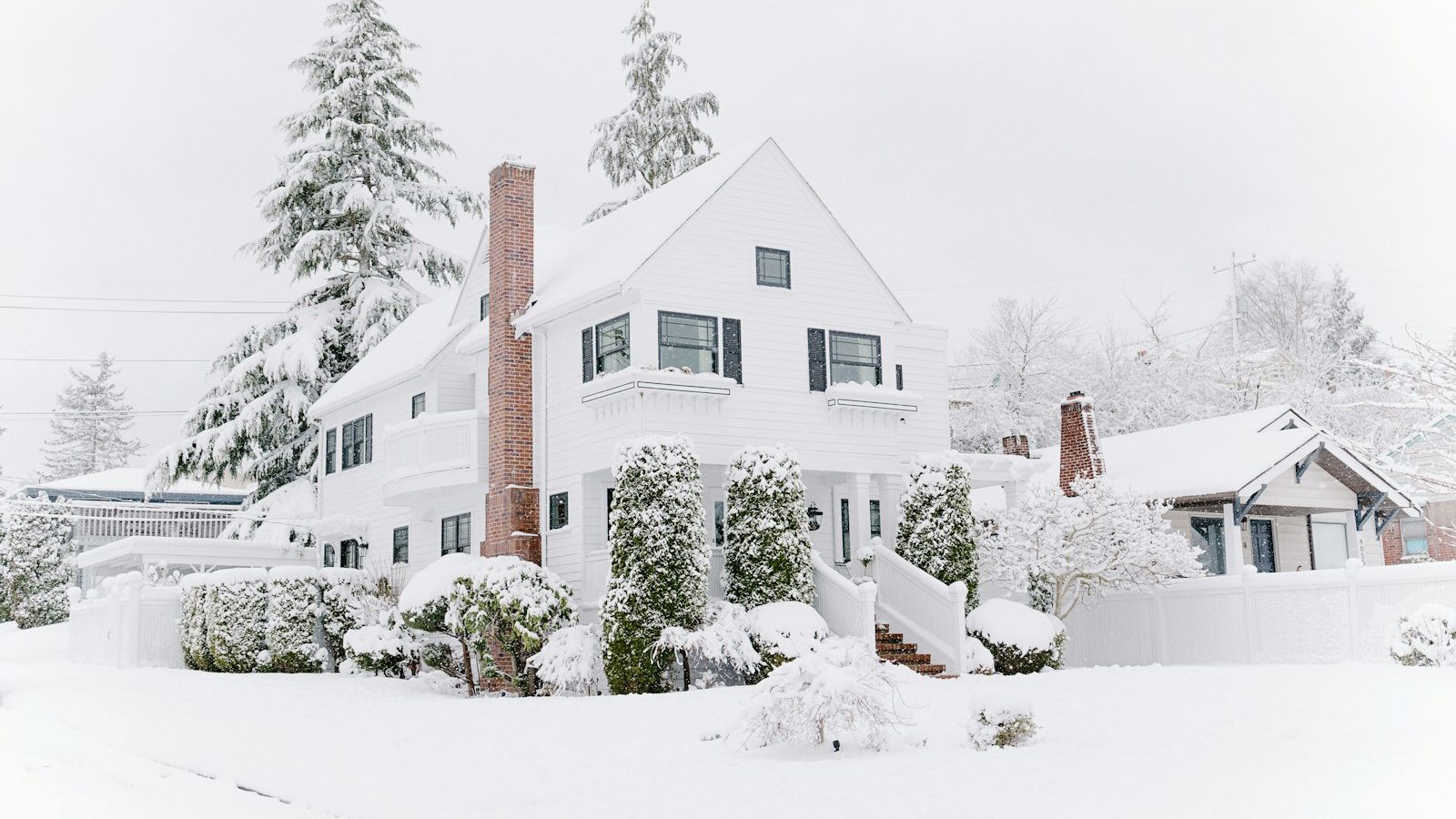 White house covered in snow during winter